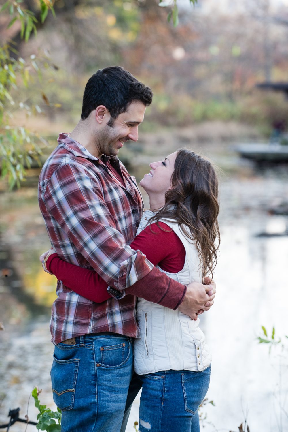 Engagement Photos Of Couple Near Lake